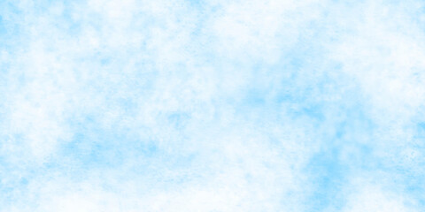Fototapeta premium Beautiful brush painted cloudy blue sky background with watercolor stains, blue painted watercolor background, lovely bright blue paper texture, Blue grunge surface texture design for creative works.