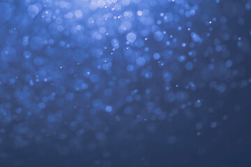 Abstract background image of blue bokeh for festival. Bokeh caused by lens blur