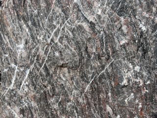 Background of natural natural stone. Structure with white veins.