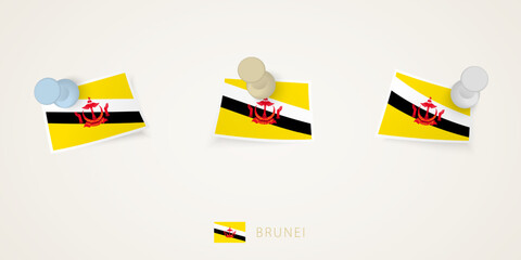 Pinned flag of Brunei in different shapes with twisted corners. Vector pushpins top view.
