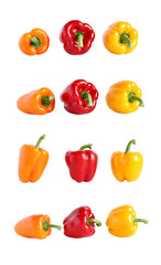 Orange, red and yellow sweet paprika isolated on white