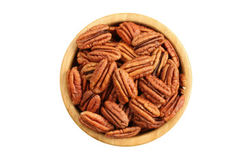 Pecan nuts in bamboo bowl isolated on white background. Top down view.