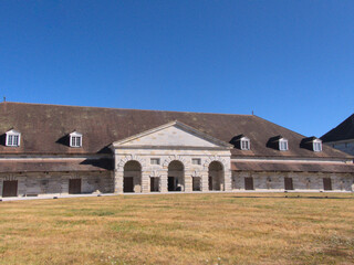 Arc-et-Senans, France 2022: Visit the magnificent Royal Saltworks built in the 18th century by the royal architect Claude-Nicolas LEDOUX.	