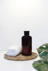 Spa cosmetics in brown glass bottles on background. Copy space for text. Beauty blogger, salon therapy, branding mockup, minimalism concept. Various Facial Massage Oils For Spa Treatment.