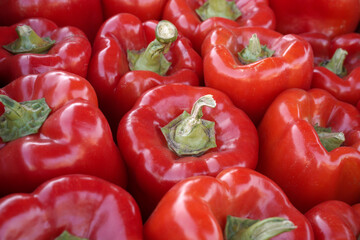 Ripe organic red bell peppers.