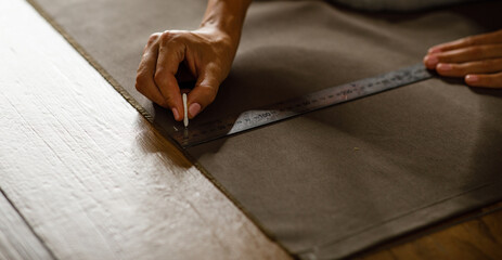 fabric marking hands ruler seamstress