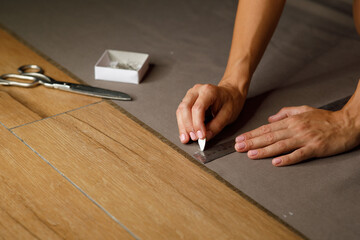 Fototapeta na wymiar lines fabric marking hands ruler seamstress