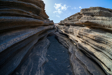 Las Grietas - volcanic fissure formed on the slopes of Montana Blanca. Lanzarote, Canary Islands....