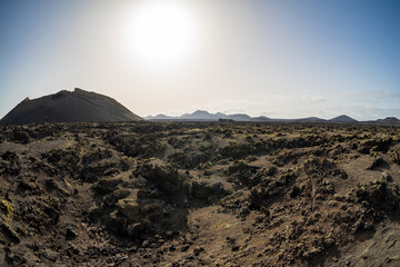 Typical volcanic landscape in the area of Caldera de Los Cuervos. Lanzarote, Canary Islands. Spain.
