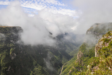 Beautiful view of Fortaleza Canyon. Misty mountains in a sunny day. Cambará do Sul, Rio Grande do Sul, Brazil