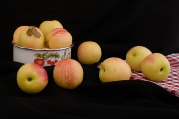 
white peach on black background
