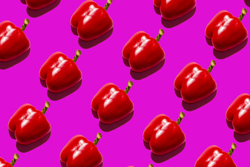 red sweet pepper pattern on bright pink background pop art design