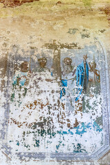Frescoes on the wall of an abandoned Orthodox church