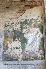 Frescoes on the wall of an abandoned Orthodox church