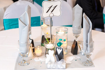Decoration of the wedding hall in the restaurant. Wedding decoration restaurant candles and food. Wedding table setting