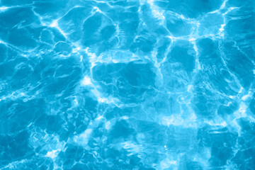 surface of blue swimming pool, or sea or ocean. background of water in swimming pool