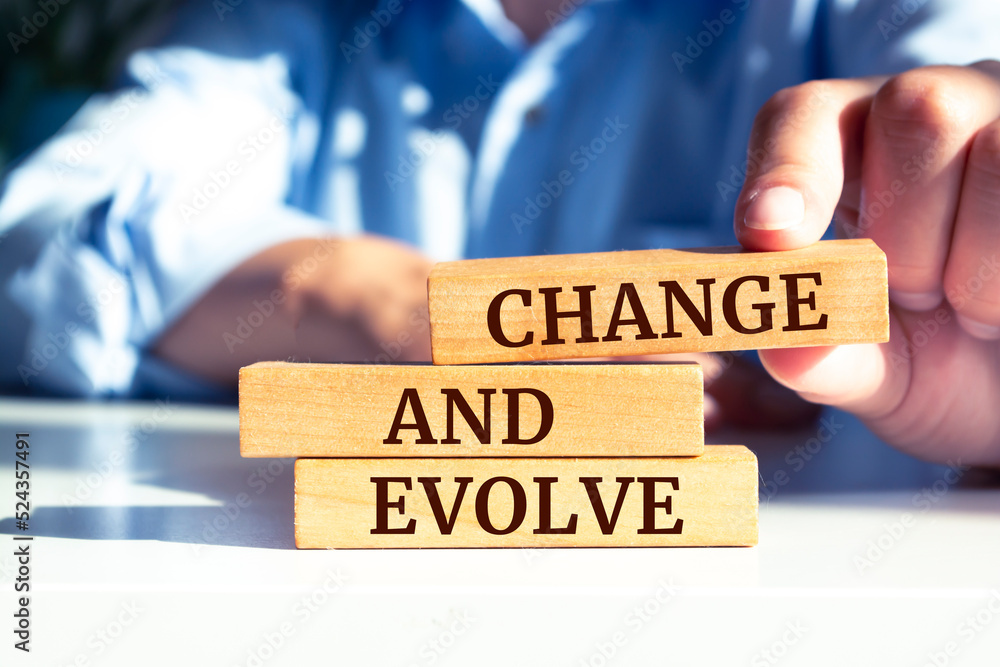 Sticker Wooden blocks with words 'Change and evolve'.