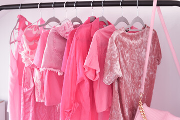 Pink woman's clothes in fitting room ,summer and spring look for girls