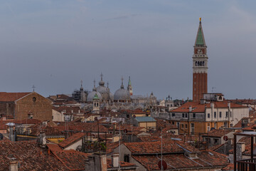 Fototapeta na wymiar top and aerial view of the canals and roof of venice igrena at sunset