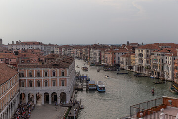 top and aerial view of the canals and roof of venice igrena at sunset