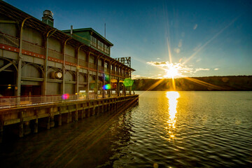 Yonkers, NY - Aug 13, 2022 Landscape view of the iconic Yonkers Recreation Pier, located at the foot of Main Street in the Downtown Waterfront District. - obrazy, fototapety, plakaty