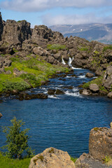 Bláskógabyggð, Iceland - July 2,2022 Vertical view of the Drowning Pool or Drekkingarhylur, located in Þingvellir (Thingvellir) National Park, located in southwestern Iceland.