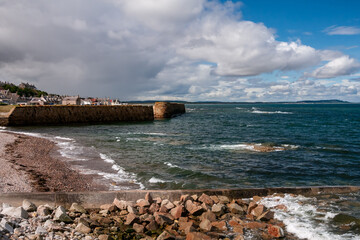 beach and sea in Buckie coastal town in Scotland on a sunny day