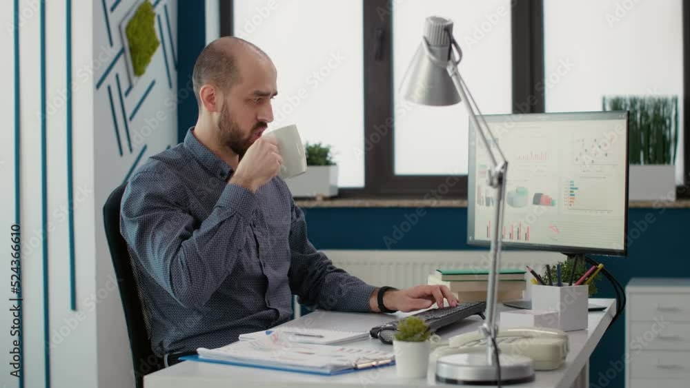 Poster sales consultant working with business statistics on charts, analyzing financial report with diagram