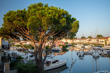 Colorful houses in Port Grimaud, village on Mediterranean sea with yacht harbour, Provence, France