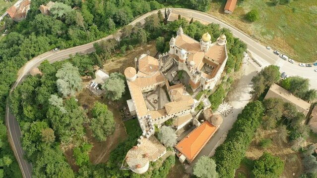 Aerial drone panoramic view of the Rocchetta Mattei castle in Italy on sunny summer day, view from above. High quality 4k footage