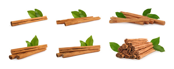 Set with aromatic dry cinnamon sticks and green leaves on white background. Banner design