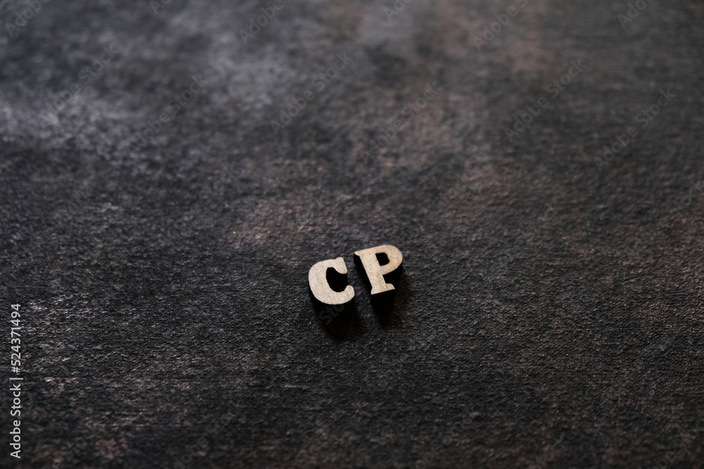 Poster the letters c and p above the dark field. initials cp