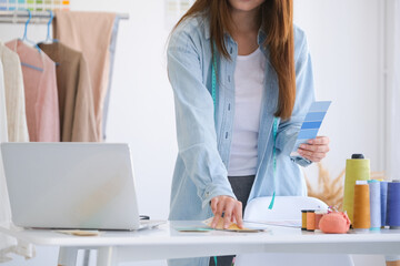 Fashion designer working in studio