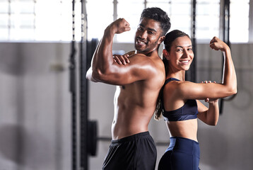 Fitness, flexing muscles and strong couple goals while doing exercise or training in a gym. Portrait of fit sports people, woman or man showing off their biceps after exercising for arm strength - obrazy, fototapety, plakaty