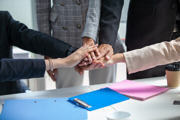 Teamwork Deal Cooperation Partnership business people giving hi-five before work in the office, touch hands for unity group to succuss business.