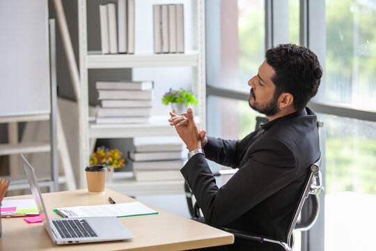 Asain Businessman Praising His Colleague In The Office, Business Concept.