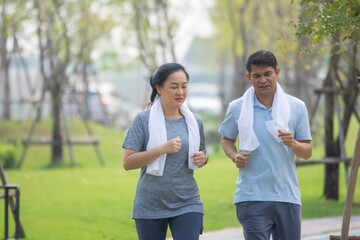 Asian people older couple retirement workout in city park