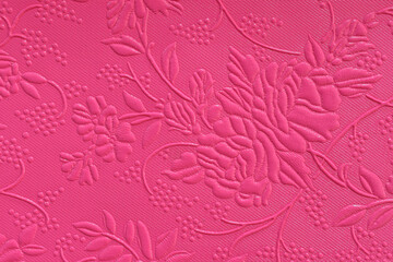 Fototapeta premium Tooled floral pattern in pink leather.