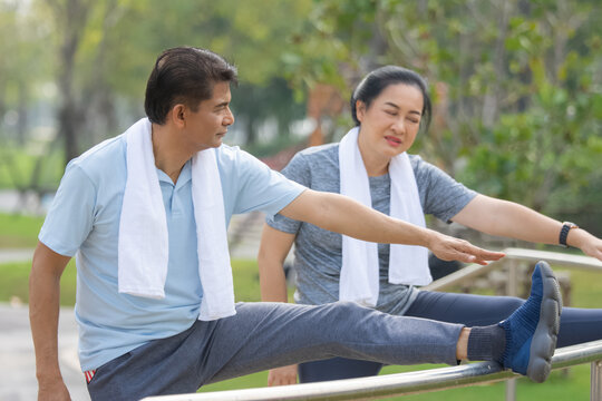 Asian people older couple retirement workout in city park