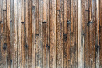 Background from a wall made of brown wooden planks