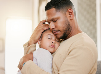 Father hugging sleeping daughter, caring for sick child and family giving loving embrace at home....