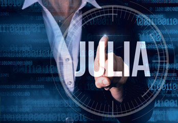 Business Woman with finger pressing Julia button on virtual screens. Modern technology concept
