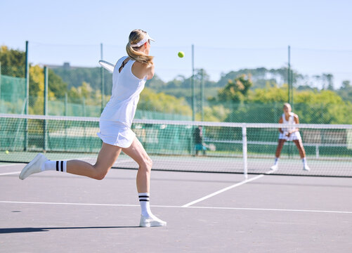 Fitness, balance and sport with woman tennis players practice competitive match at a sport court. Professional athlete workout at a game or competition. Lady training sports together with partner