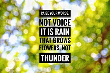 the words Raise your words, not voice with a blurred green leaf background