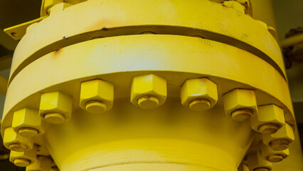 The flange and bolt nut are portrayed on industrial drain valve pipes.