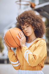 Basketball court, sports and woman player with motivation, vision or wellness goal for training,...