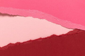 Torn red pink cardboard. Texture background.