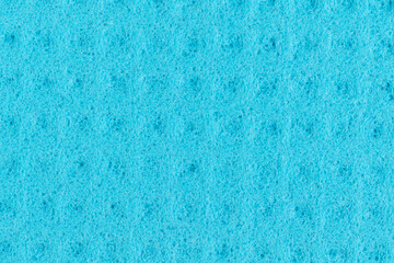 Blue washing rag background. Close up.