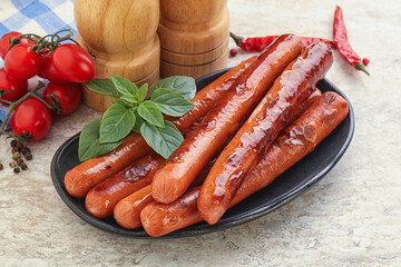 Roasted sausages in the plate