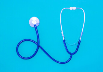 stethoscope on blue background